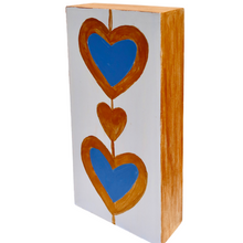 Load image into Gallery viewer, Contemporary abstract heart artwork featuring royal blue hearts and gold detailing on a crisp white background.
