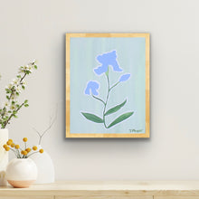Load image into Gallery viewer, Modern floral iris print with graceful botanical styling and soft pastel-inspired color palette. Feminine botanical wall art featuring a periwinkle iris flower and minimalist contemporary design. Gallery wall floral print with blue and purple iris artwork reproduced from Jeanne Player’s original painting.
