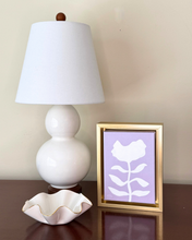 Load image into Gallery viewer, colorful and happy flower painting with a white flower on a light purple background in a gold frame.
