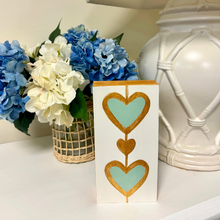 Load image into Gallery viewer, Vertical heart artwork in mint green, white, and gold designed for bookcases, desks, and layered shelf styling.
