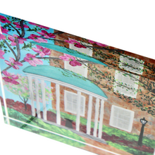 Load image into Gallery viewer, Small UNC Old Well acrylic keepsake block displayed on shelf with classic Chapel Hill campus architecture artwork.
