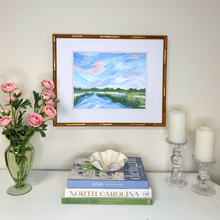 Load image into Gallery viewer, Framed coastal marsh artwork with white mat and optional gold bamboo frame for elegant beach house decor.
