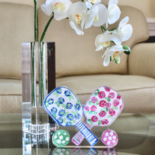 Load image into Gallery viewer, Whimsical pickleball paddle acrylic art block with vibrant floral artwork designed for desks, shelves, and tabletop décor.
Decorative acrylic shelf sitter featuring a floral pickleball paddle illustration with playful pink and blue painterly details.
