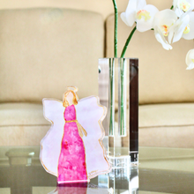 Load image into Gallery viewer, Christian angel acrylic block decor with uplifting pink and gold angel artwork displayed in a modern freestanding acrylic design. Pink and gold angel shelf sitter art featuring Jeanne Player’s original inspirational angel artwork mounted inside a clear acrylic block.
