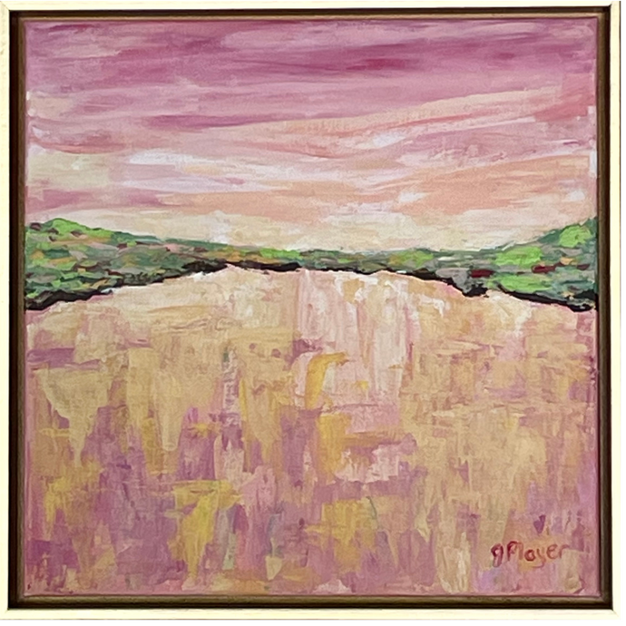 This is a square abstract expressionism painting. It is in a gold float frame. This pink landscape painting has a pink, orange and white sunset on the top that reflects the same colors at the bottom. It is divided by a green, brown, red, pink and gray landscape.