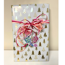 Load image into Gallery viewer, Decorative pickleball ornament styled in a bright, preppy setting for a pickleball enthusiast
