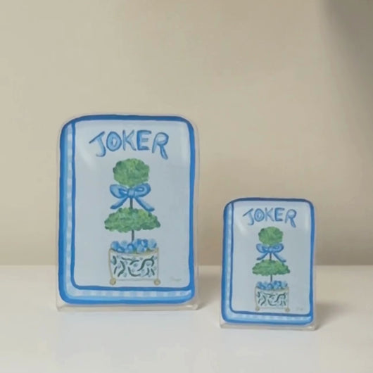 Blue mahjong acrylic block with double green topiary, blue bow, and gold details