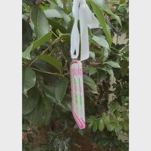 Load and play video in Gallery viewer, Mahjong ornament with shades of pink, white, green and gold feauring a double topiay design with a pink bow.

