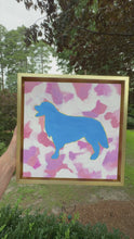 Load and play video in Gallery viewer, Colorful Golden Retriever dog art with a pop art style.  Blue dog outlined in gold with a pink camo background. Would be perfect in a girls room.

