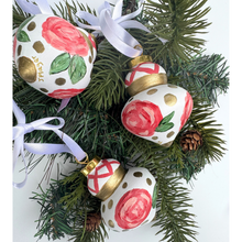 Load image into Gallery viewer, One-of-a-kind hand-painted Christmas ornament featuring abstract floral artwork with pink flowers, green leaves, and shimmering gold details.
