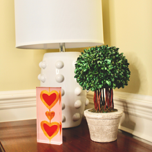 Load image into Gallery viewer, Vibrant pink and gold heart acrylic art block featuring pop art inspired hearts, a unique Valentine’s gift idea and beautiful modern home decor accent.
