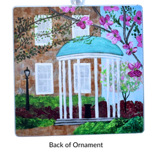 Load image into Gallery viewer, Tar Heels holiday ornament featuring Jeanne Player Fine Art artwork of the historic Old Well at UNC Chapel Hill.

