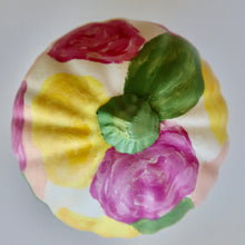 Load image into Gallery viewer, Top of a bright and colorful hand painted pumpkin wtih a floral design.
