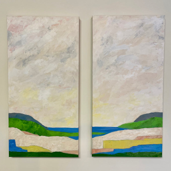 Two coastal abstract paintings, Seaside I and Seaside II, styled together above a console table. Soft blues, greens, peach, gray, and tan evoke the calming feeling of the beach. Beach House Wall Art – Seaside Diptych Abstract Landscape

Large Coastal Abstract Seascape Paintings – Set of Two

Seaside I & II – Modern Coastal Home Decor Art on Canvas
