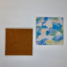 Load image into Gallery viewer, Beach house gift featuring a set of two absorbent ceramic coasters with original abstract coastal art, perfect for coffee tables, cocktails, and seaside entertaining.
Colorful sea glass inspired coasters with abstract ocean artwork, designed with ceramic stone tops and cork backing to protect furniture while adding coastal charm.
Jeanne Player Fine Art Sea Glass Coasters featuring original abstract coastal artwork in calming ocean colors, a unique hostess gift and coastal kitchen accessory.
